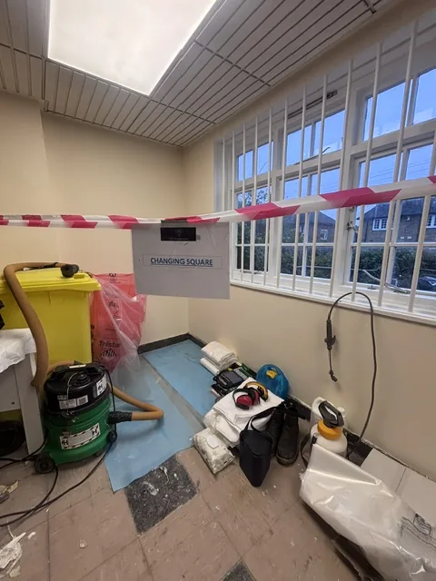 Asbestos floor tile and bitumen removal in Bromley by Bow